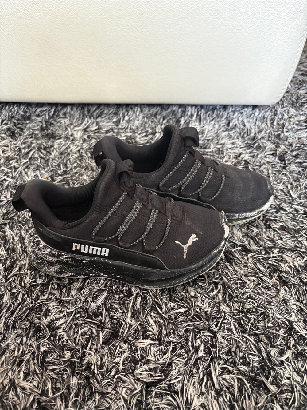 Puma Black Kids Slip-On Athletic Shoes with White Logo